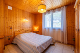 chambre grand lit appartement2chambres-rezchalet-ciboulette-laclusaz