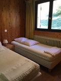 Chambre 2 lits 90 locationappartement-centrevillage-laclusaz-crystal21